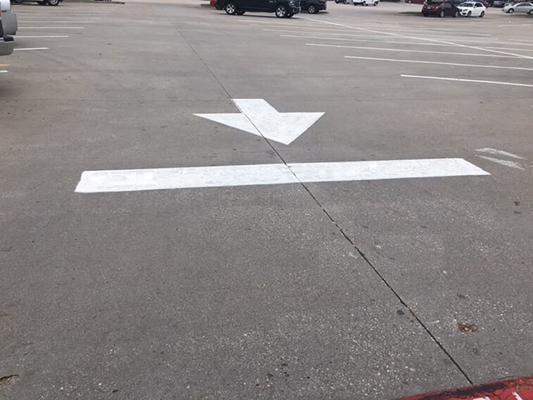Directional arrow with line in your parking lot Grapevine, Texas