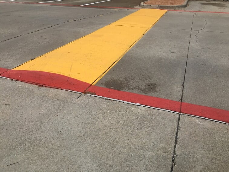 Speed bumps installed in your parking lot in Grapevine, Texas