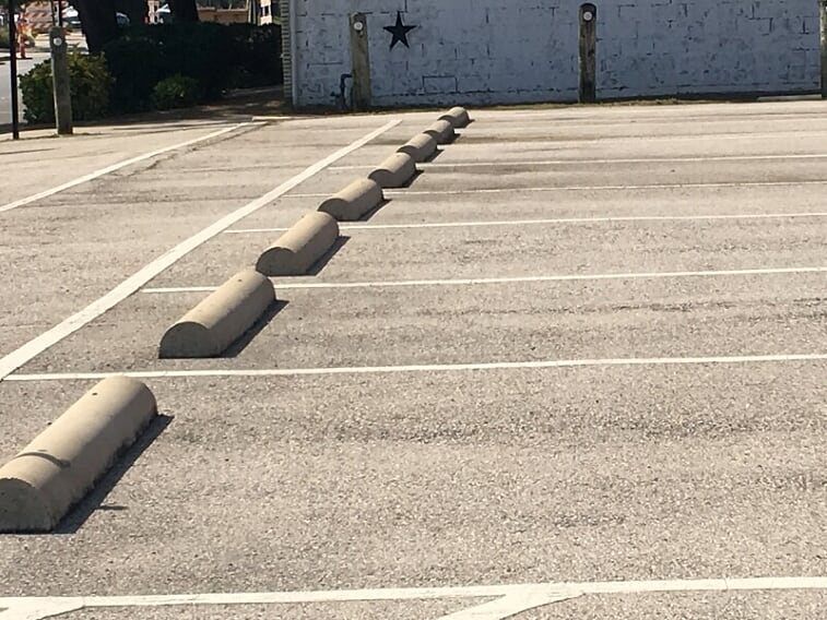 Wheel Stops installed in your parking lot in Grapevine, Texas
